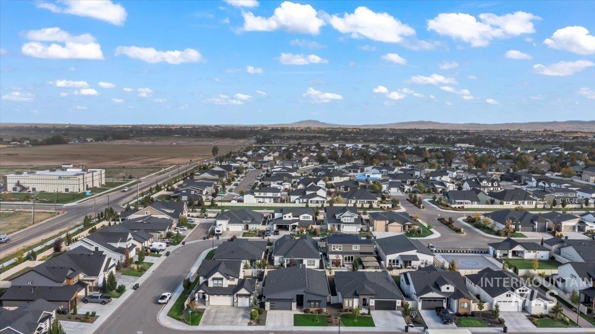 View of property location with nearby suburban area and a mountain backdrop