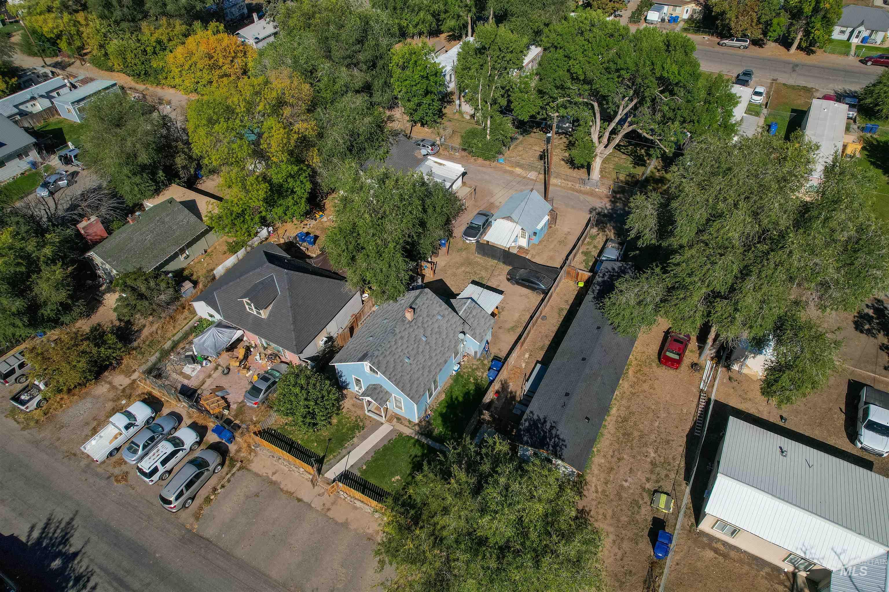 Aerial view of property's location with nearby suburban area