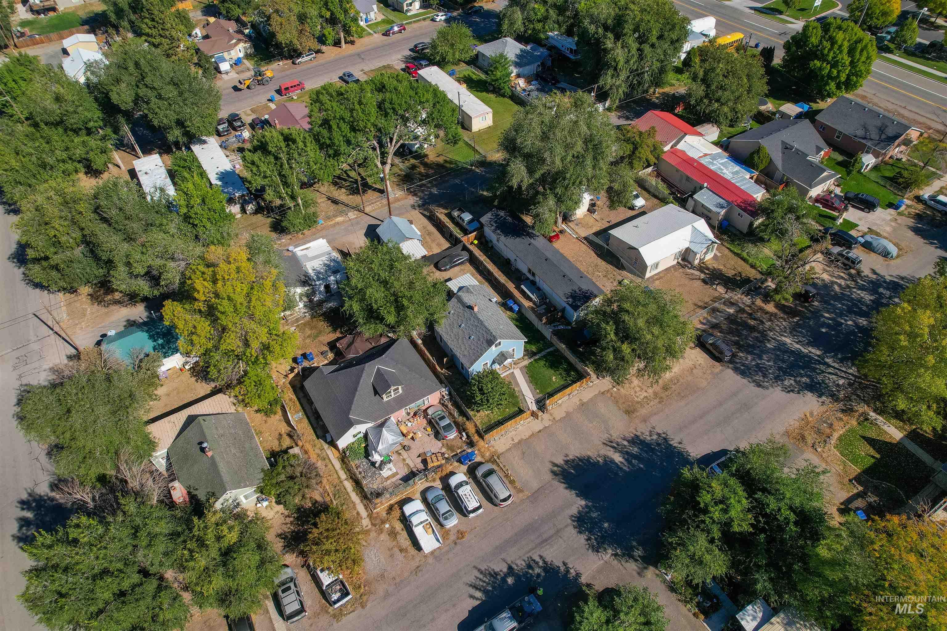 Aerial view of property's location featuring nearby suburban area