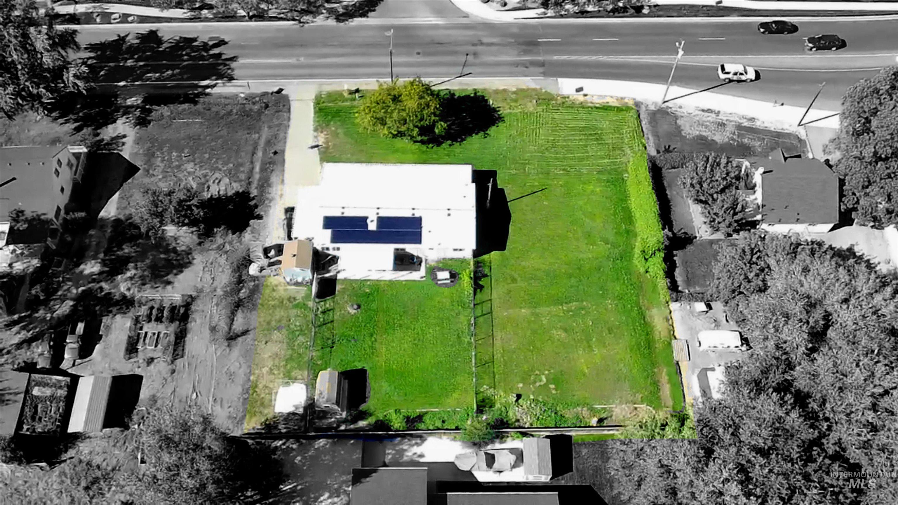 Aerial overview of property's location with property parcel outlined