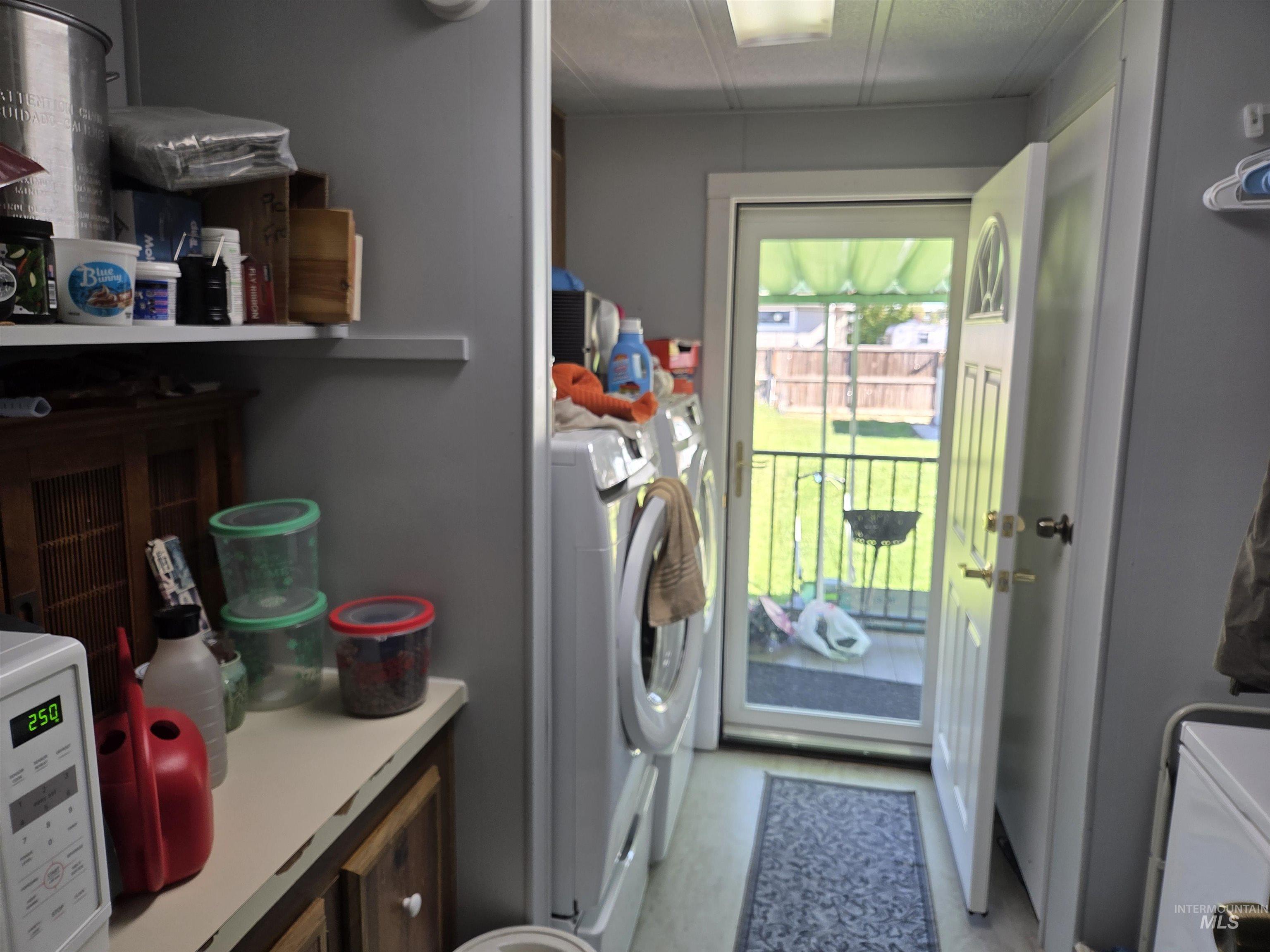Laundry area featuring washing machine and dryer