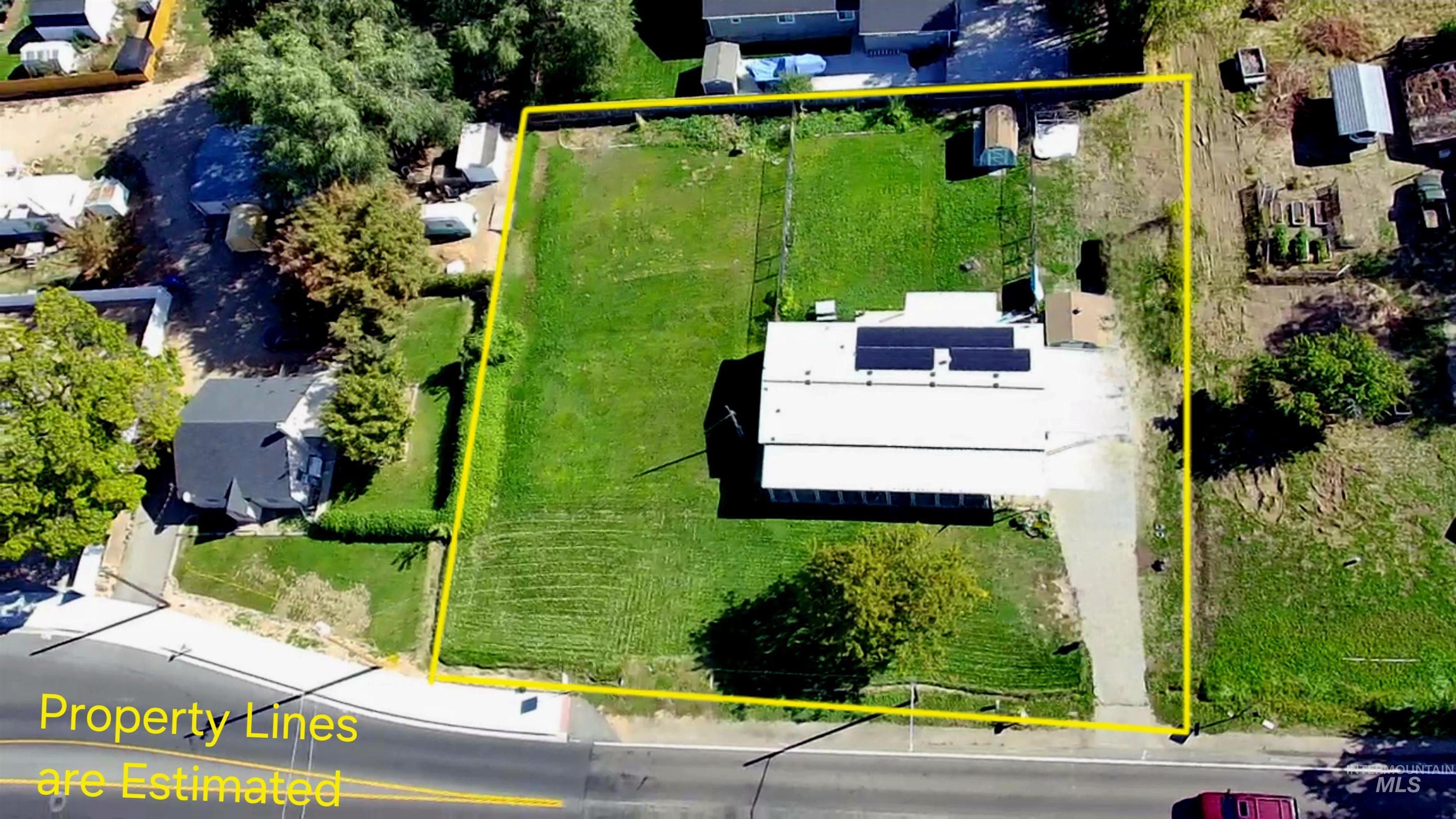 Aerial overview of property's location featuring property boundaries highlighted
