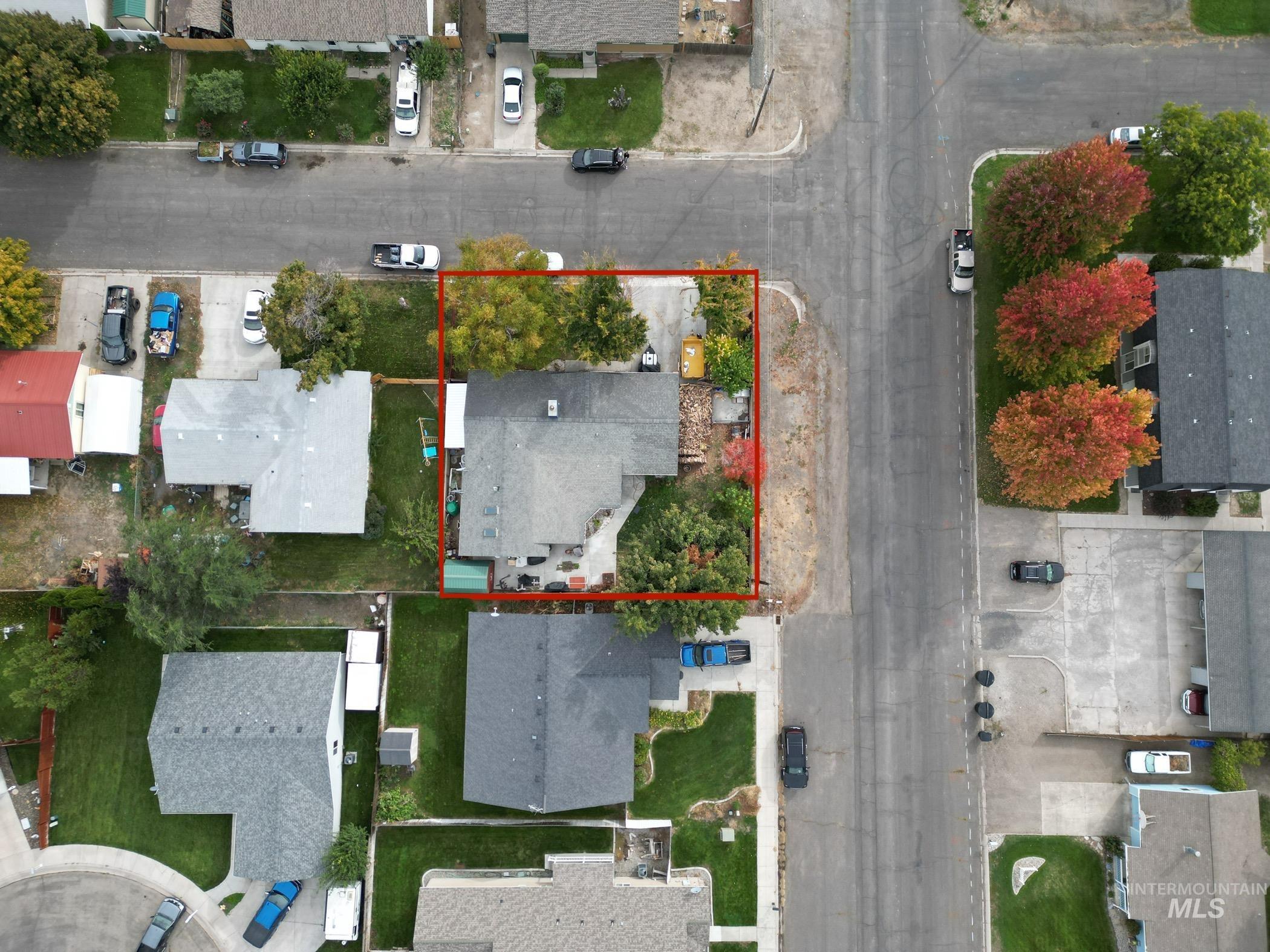 Aerial perspective of suburban area with property boundaries highlighted