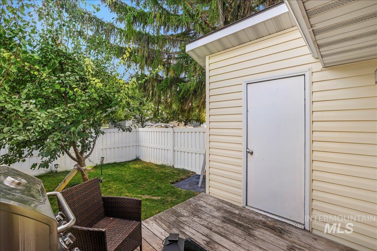 View of outdoor structure featuring a fenced backyard