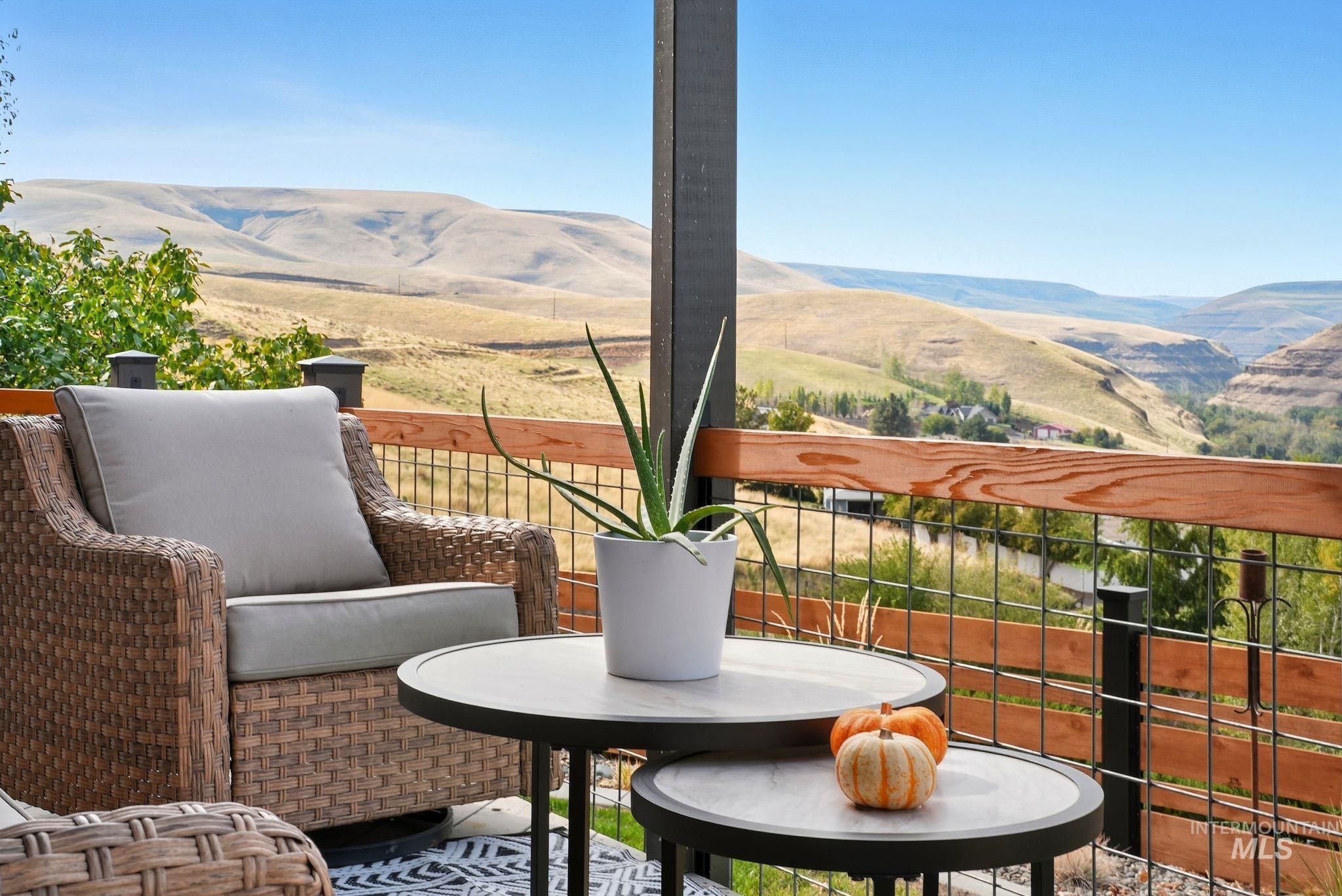 Patio / terrace featuring a mountain view