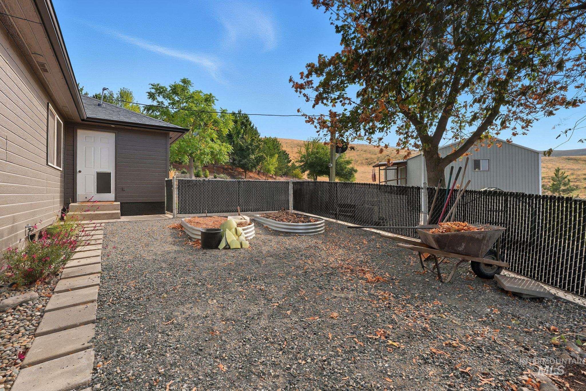 View of fenced backyard