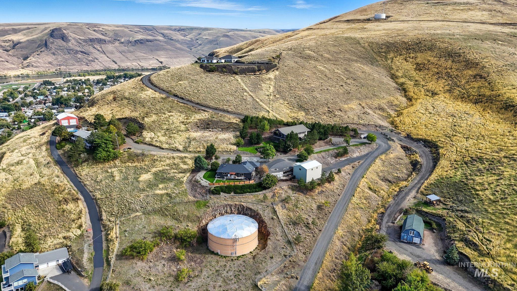 Aerial overview of property's location featuring mountains