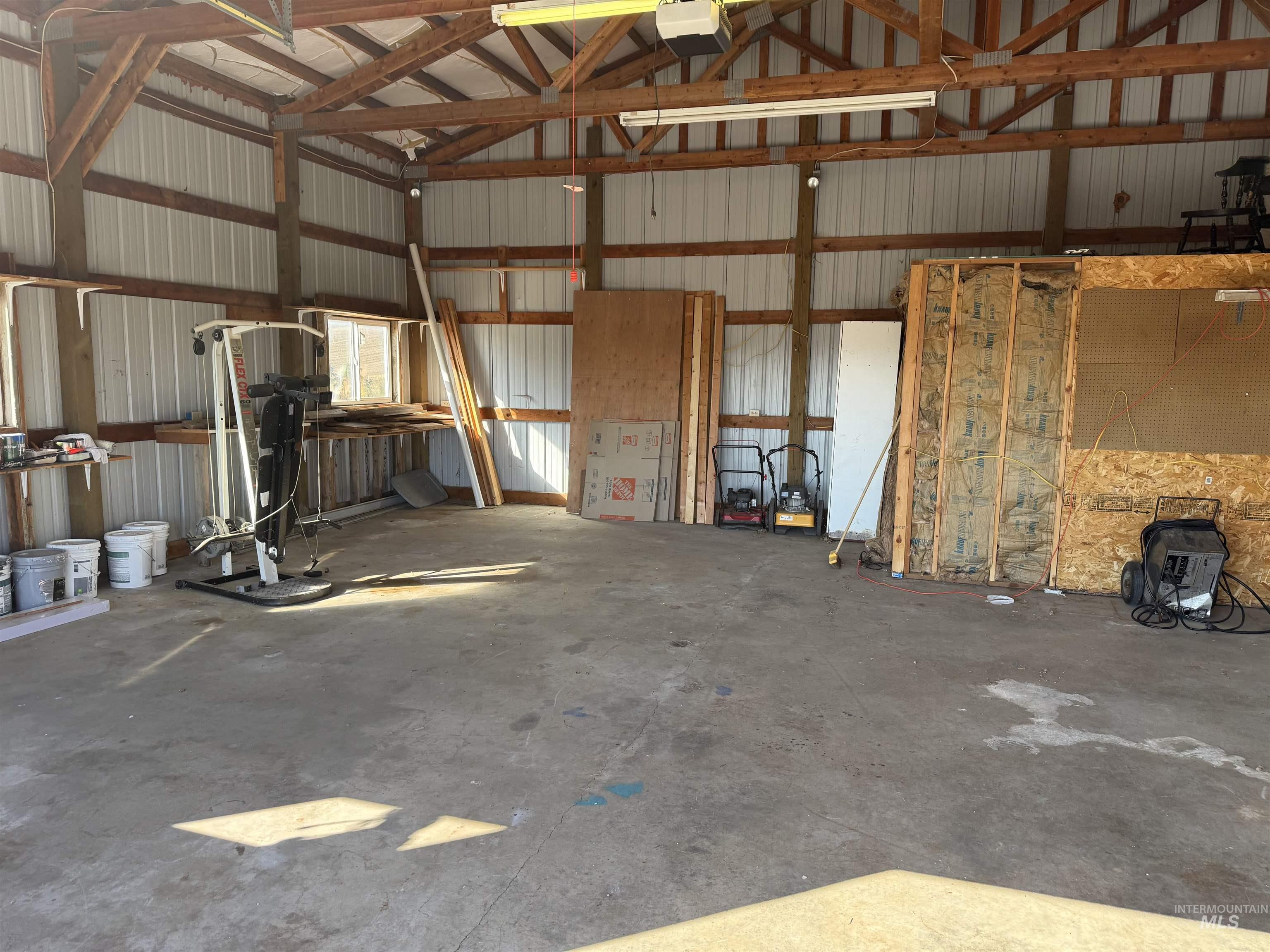 Garage with metal wall and a garage door opener