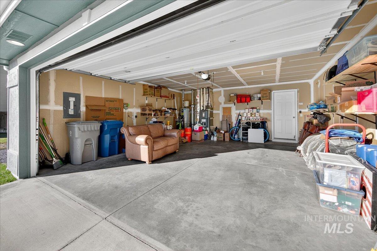 Garage featuring electric panel
