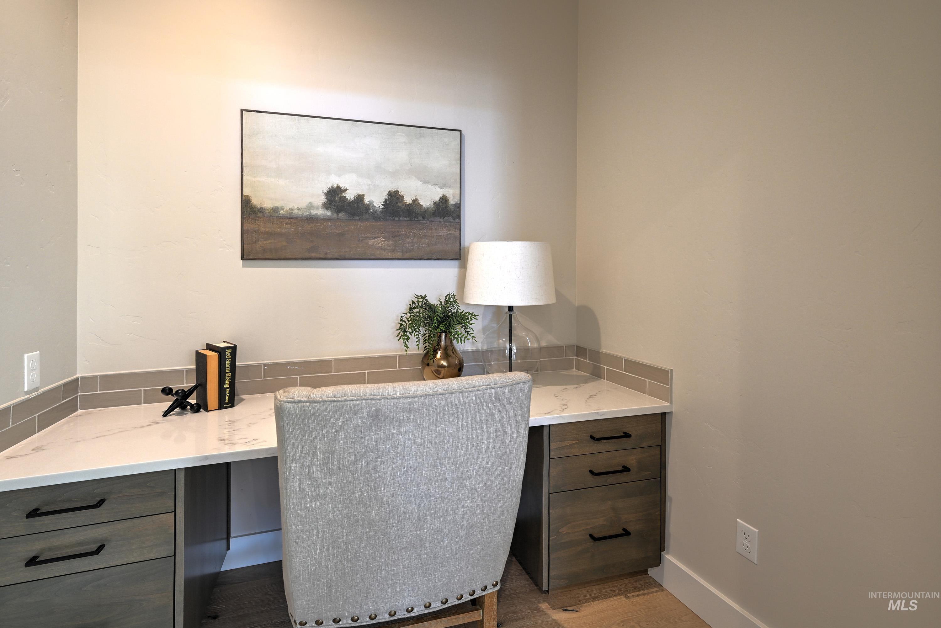 Office with light wood finished floors