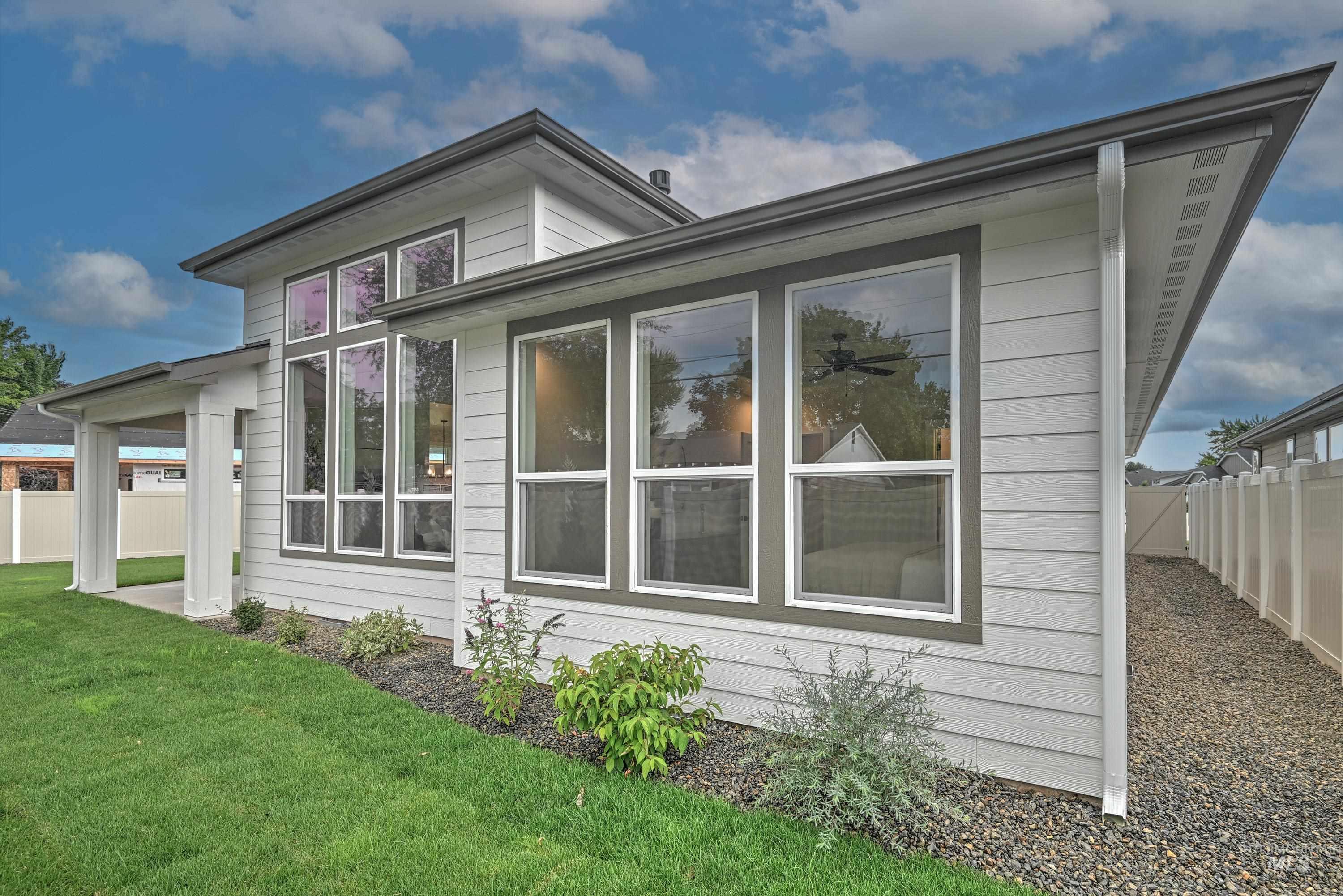 View of property exterior featuring a fenced backyard