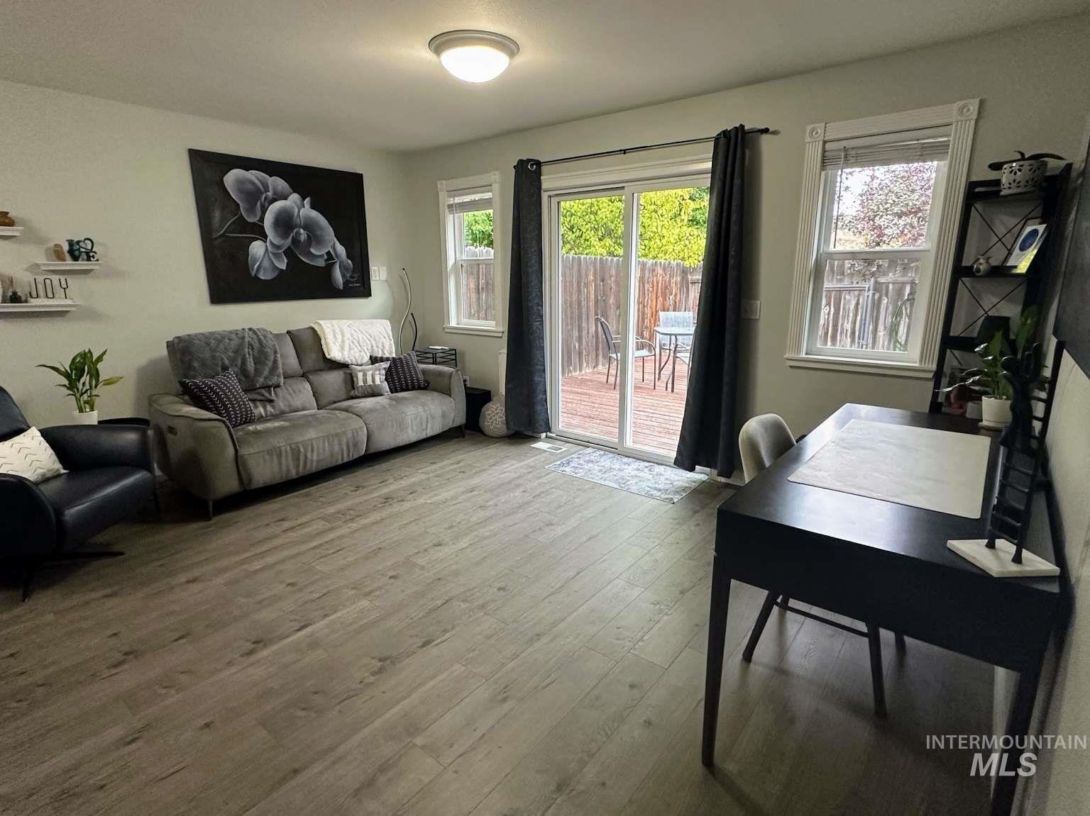 Living area with wood finished floors