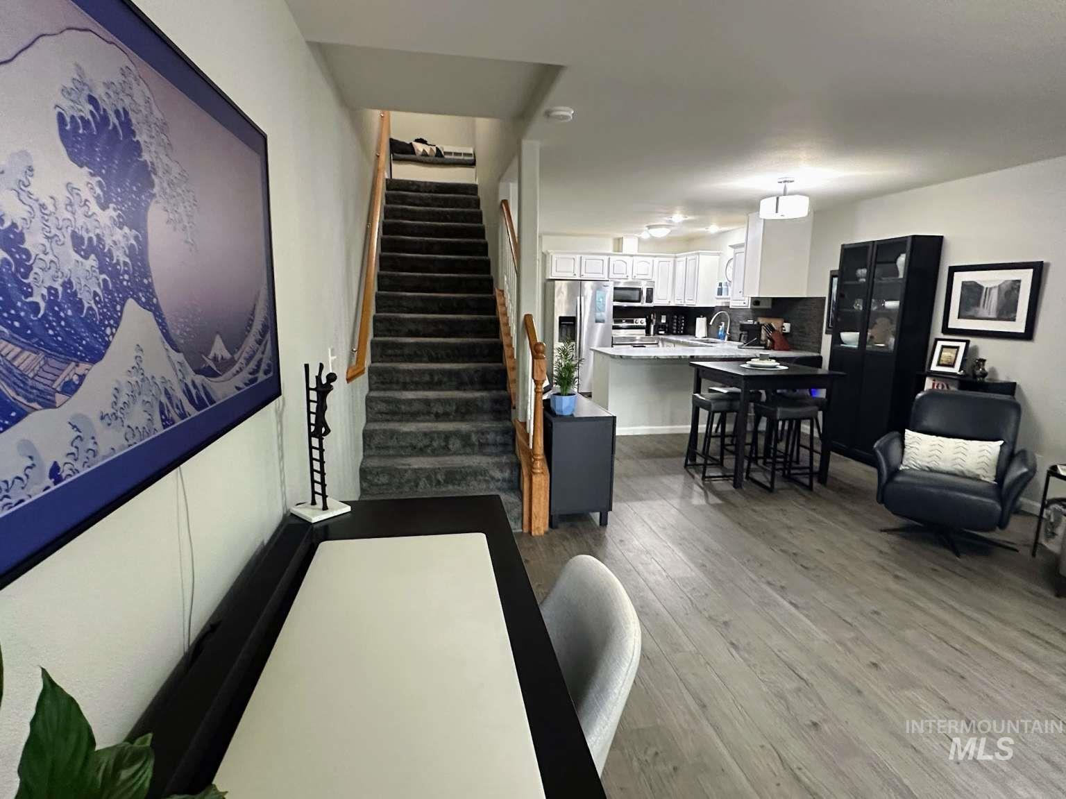 Stairway with wood finished floors