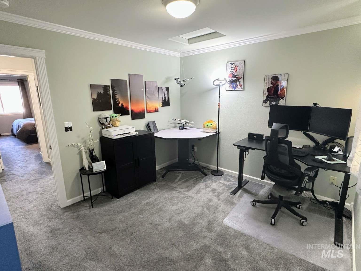 Office featuring ornamental molding, light colored carpet, and attic access