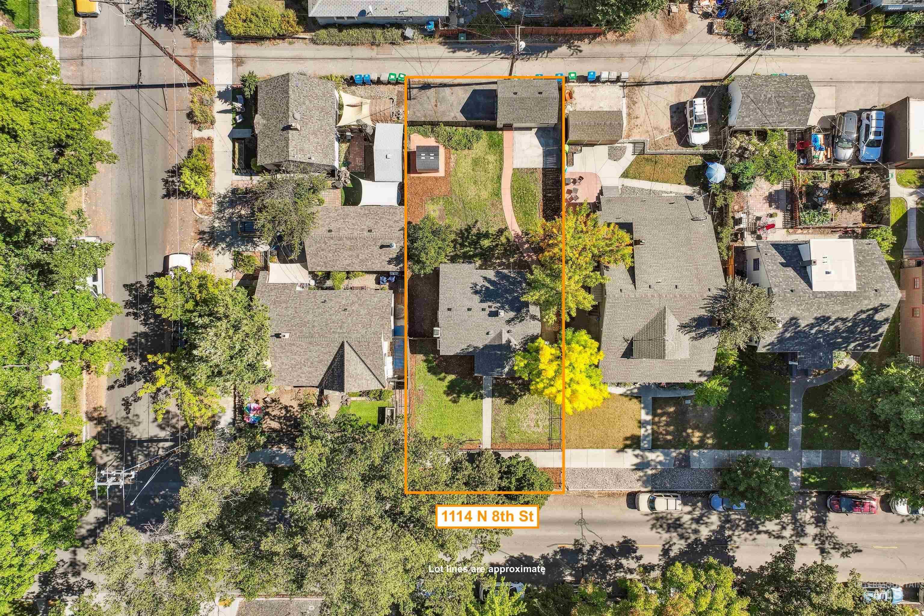 Aerial perspective of suburban area with property parcel outlined