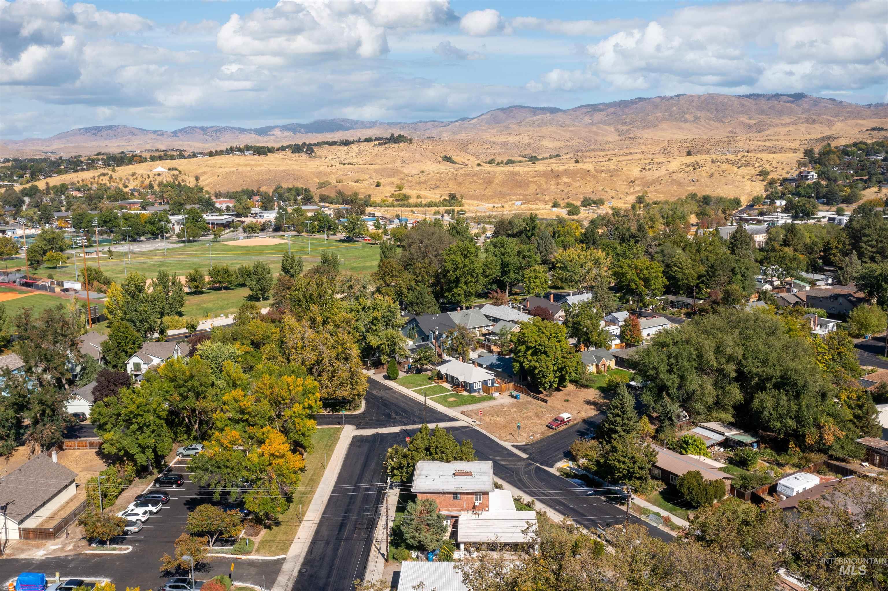 Aerial perspective of suburban area with mountains