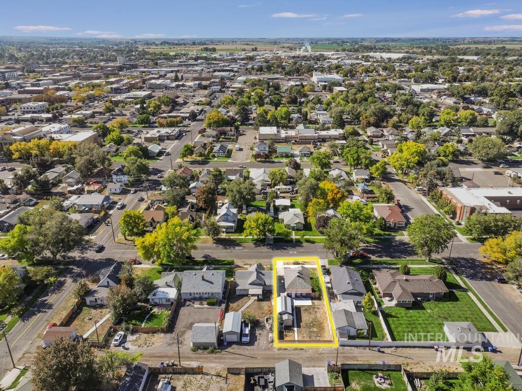 Aerial perspective of suburban area with property boundaries highlighted