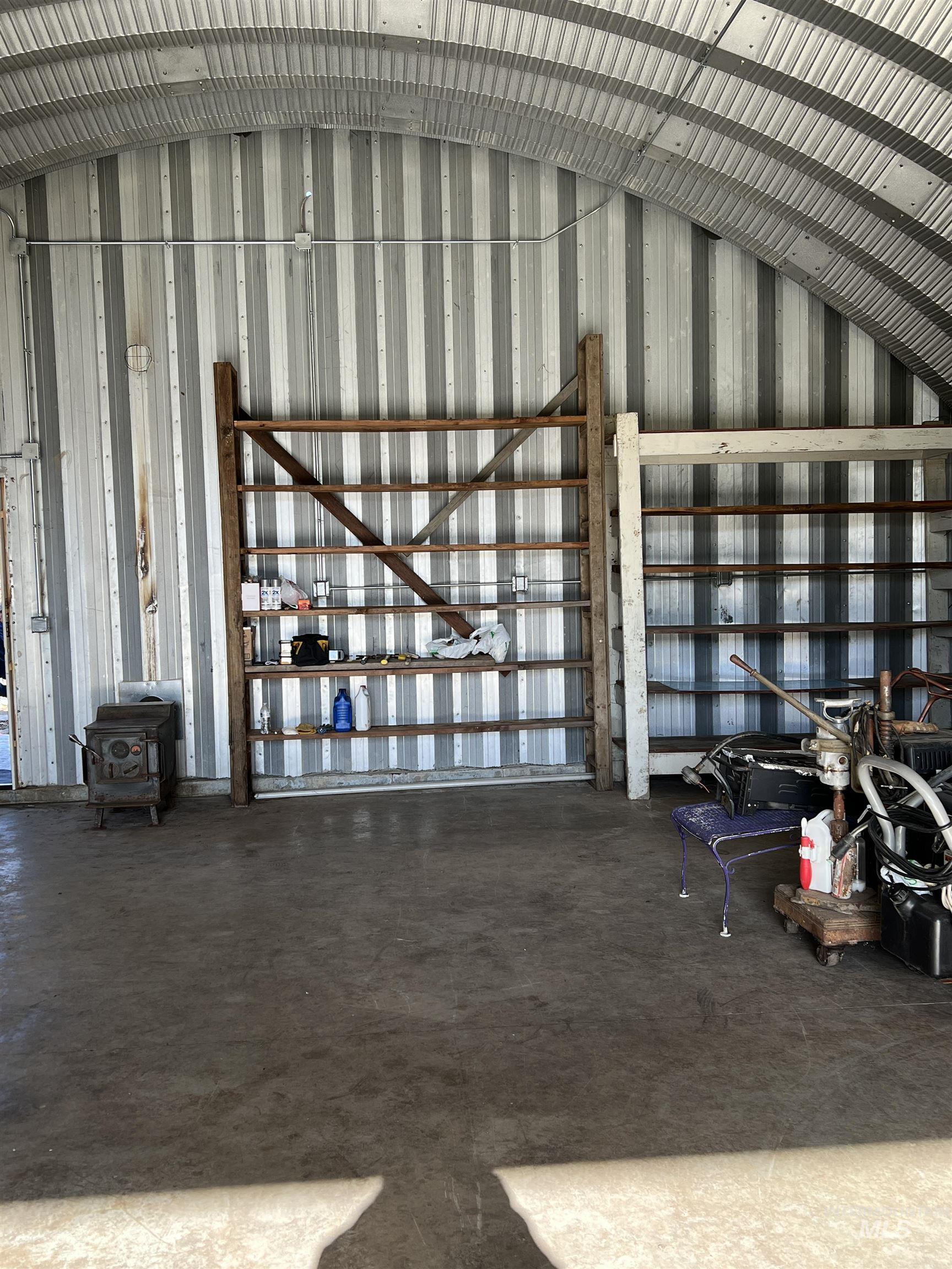 Garage featuring metal wall