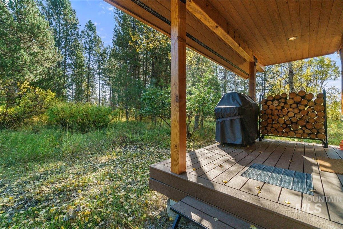 Wooden terrace with area for grilling