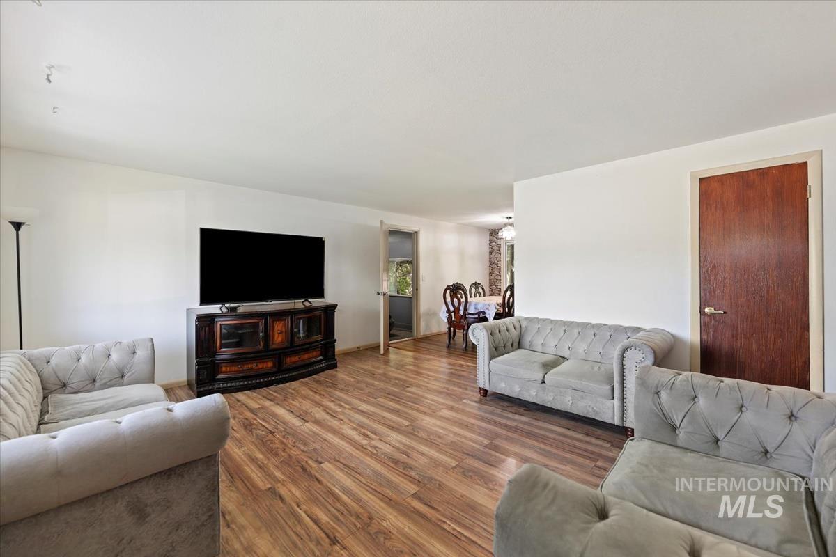 Living area featuring wood finished floors