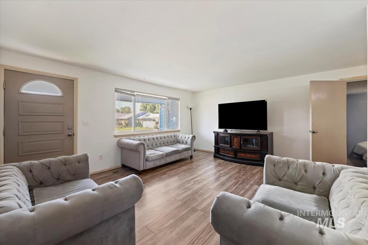 Living area with wood finished floors