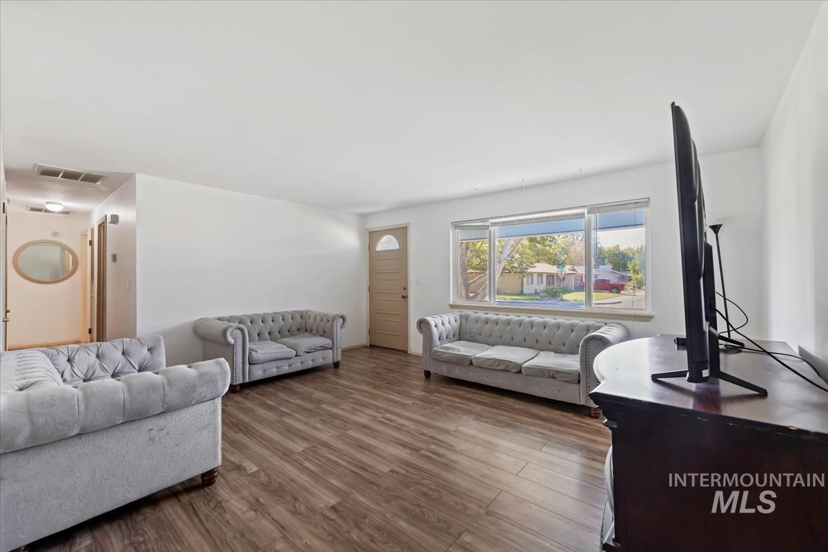 Living area featuring wood finished floors