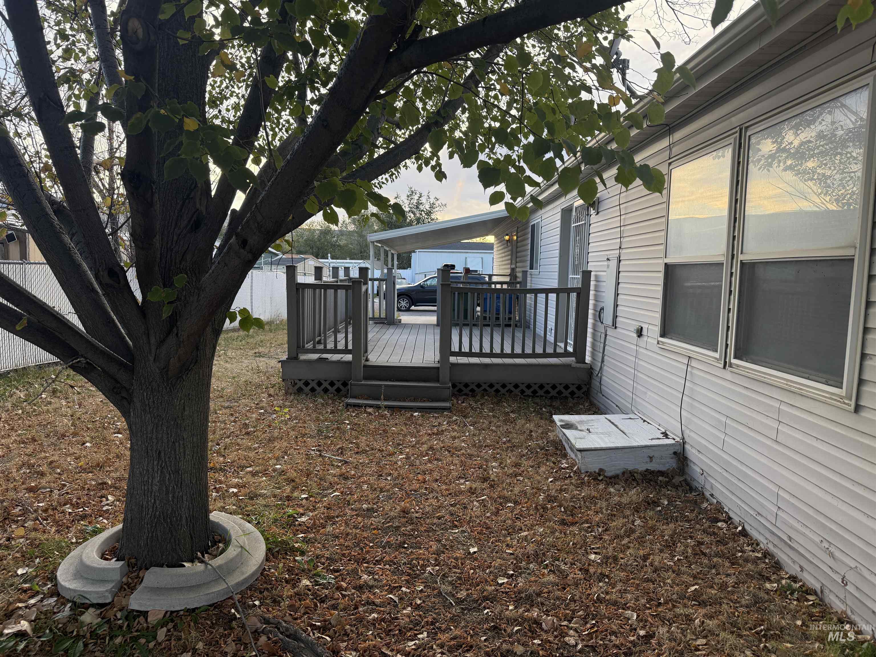 View of yard with a deck