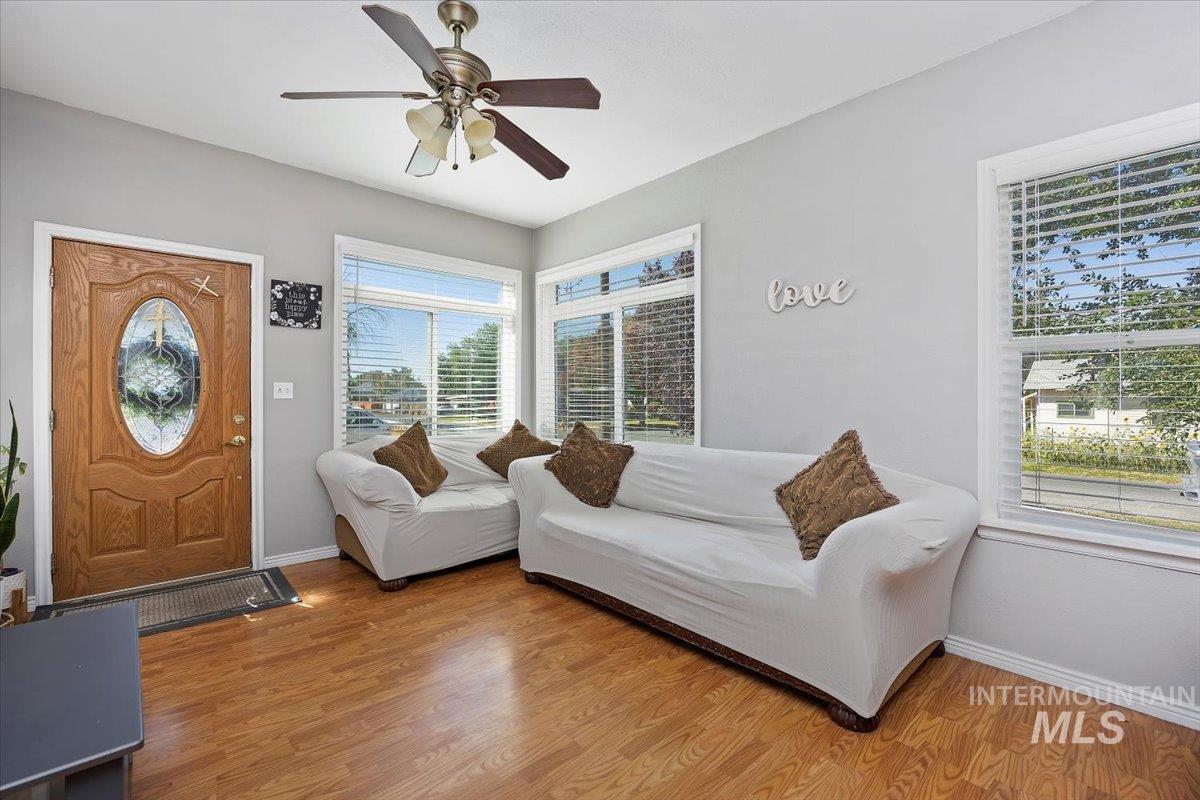 Bedroom featuring wood finished floors and ceiling fan