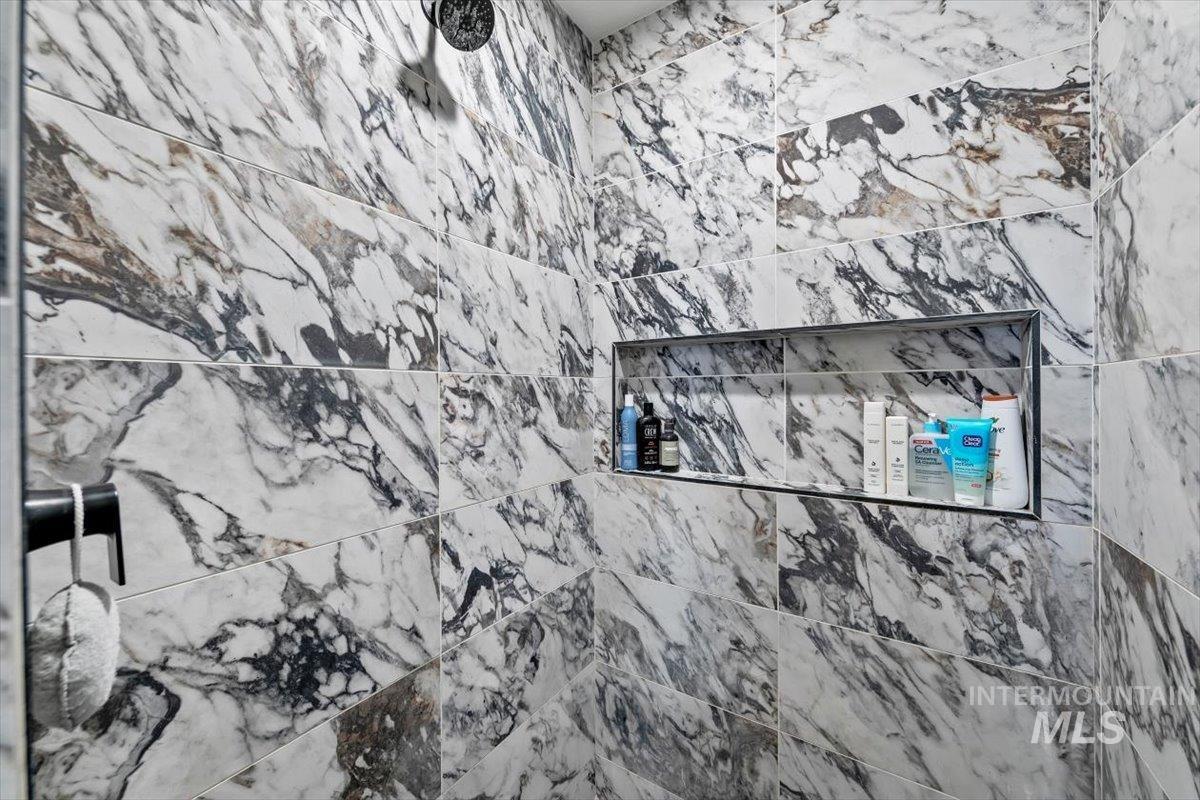 Bathroom view of tiled shower