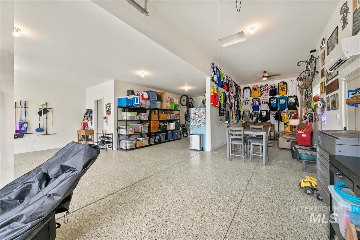 Garage with freestanding refrigerator