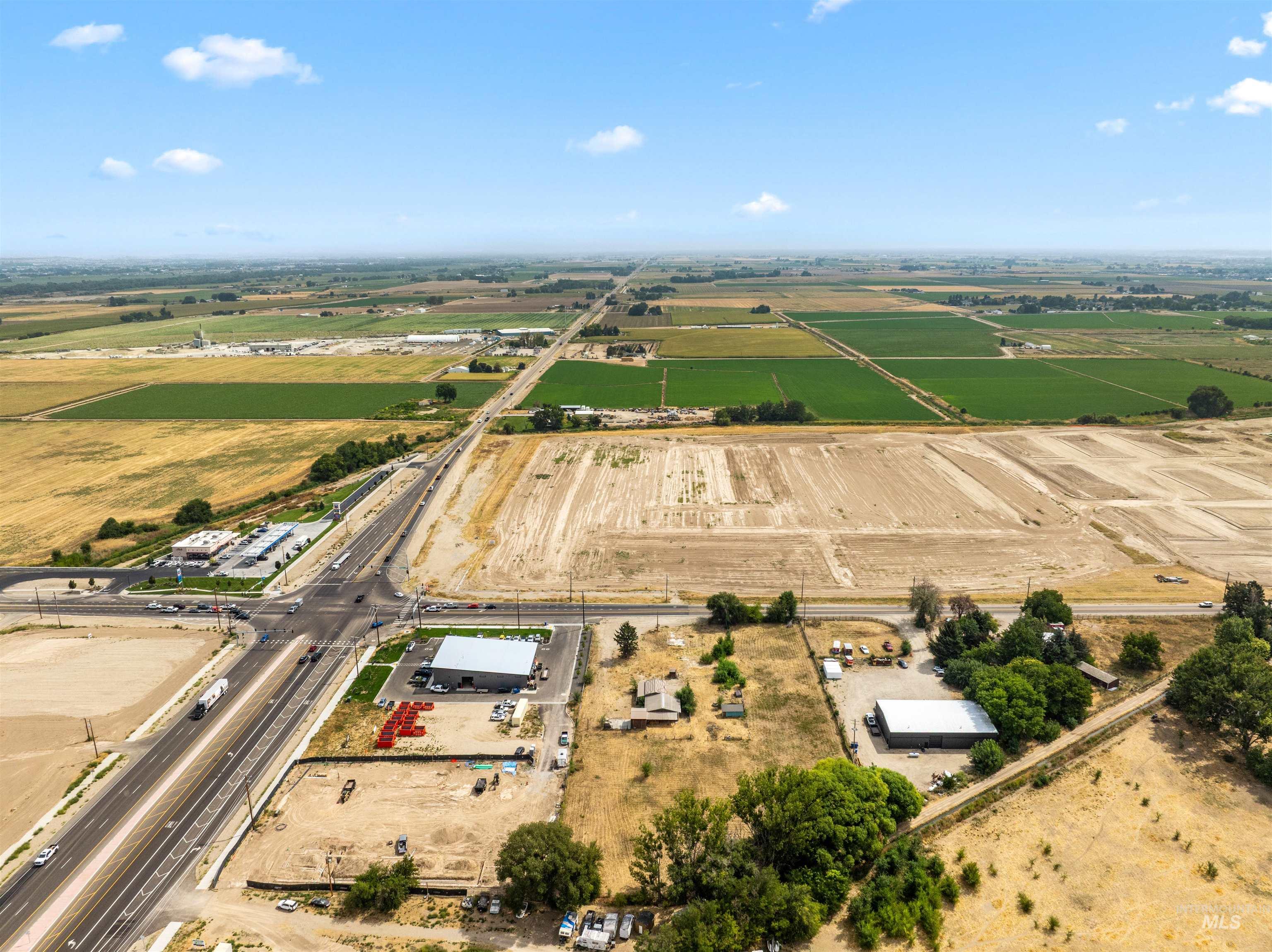 Aerial view of sparsely populated area with abundant farmland