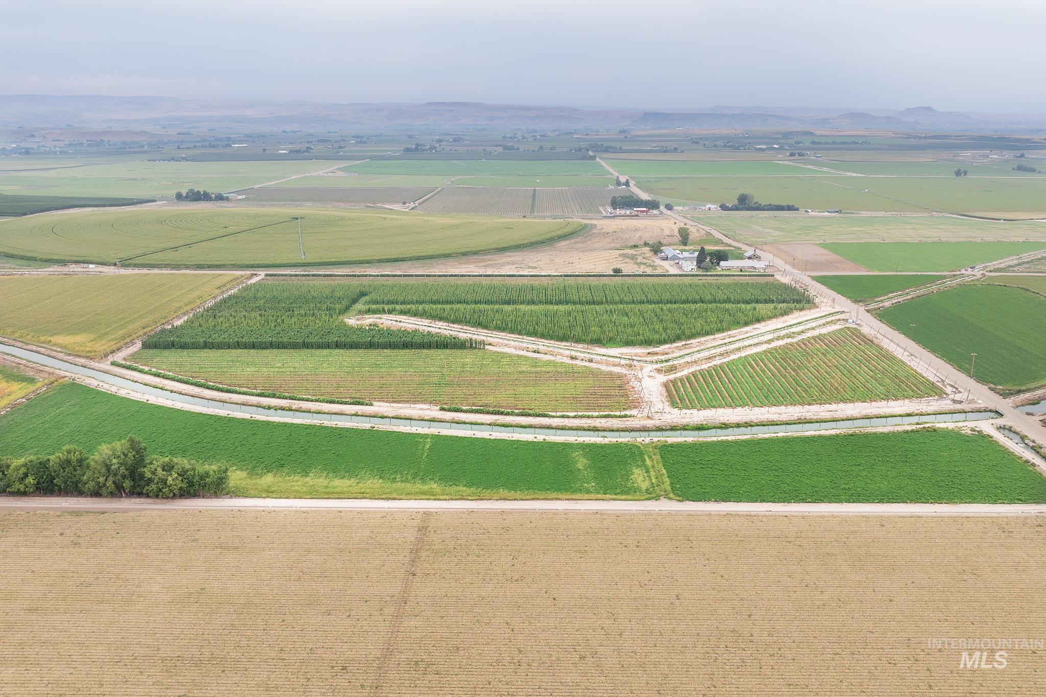 View of rural area featuring large plots for crops