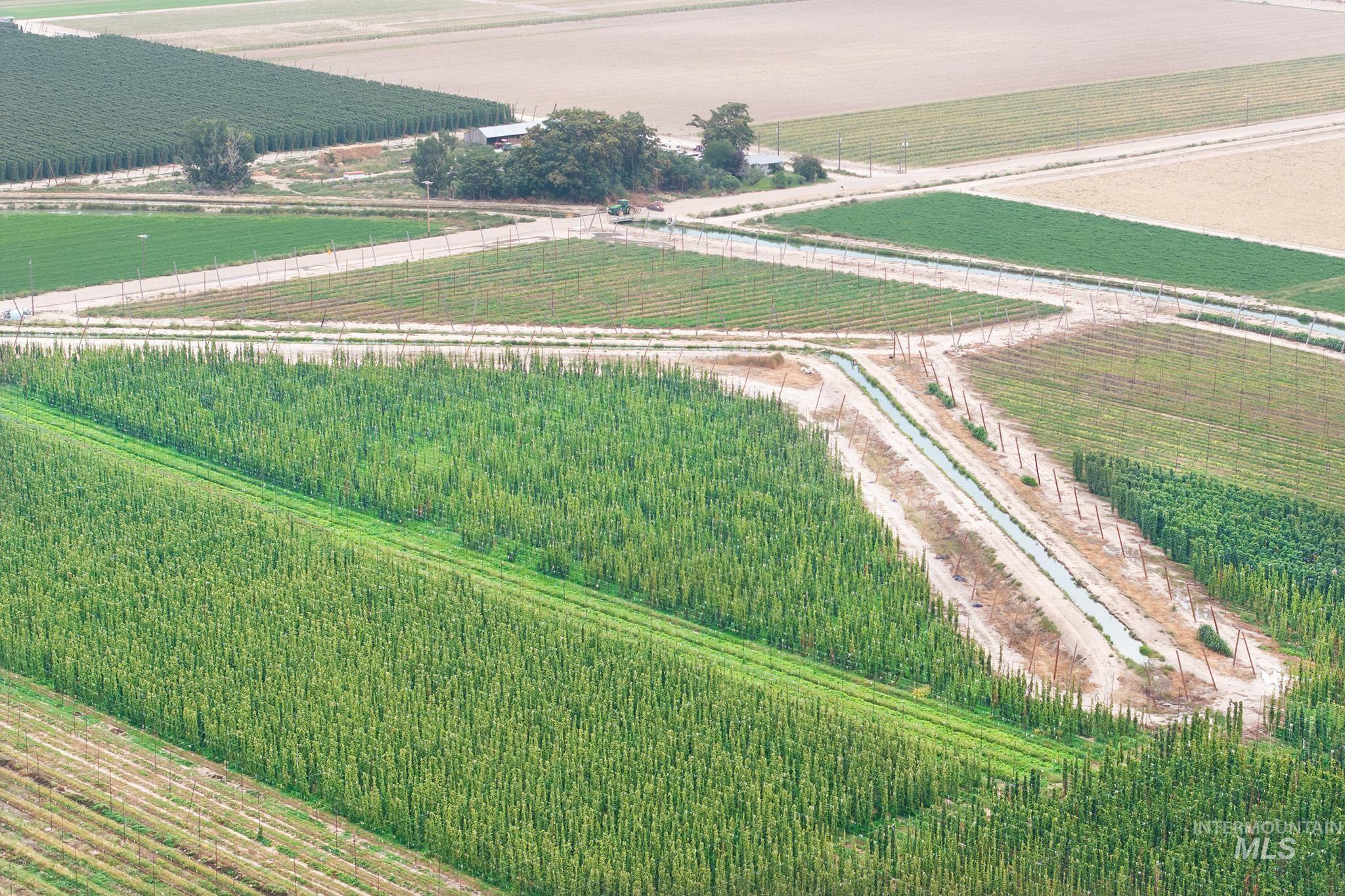 Aerial view of sparsely populated area featuring extensive farmland