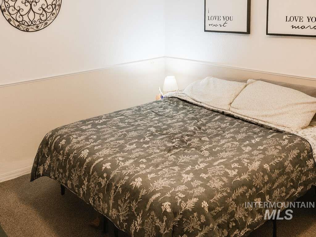 Bedroom featuring carpet flooring