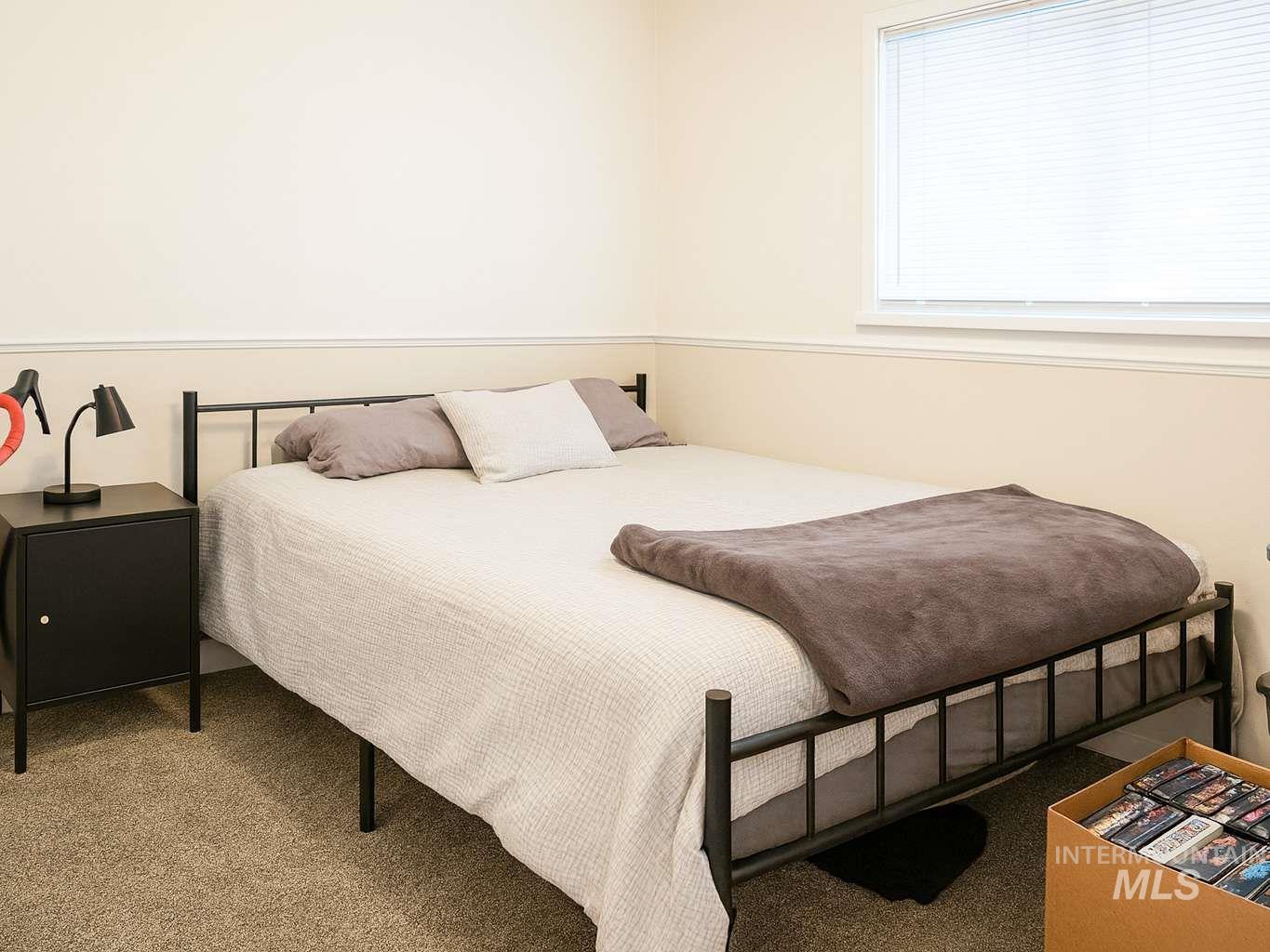 Bedroom featuring carpet