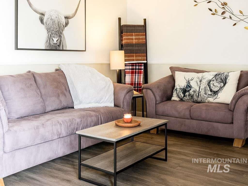 Living area featuring wood finished floors