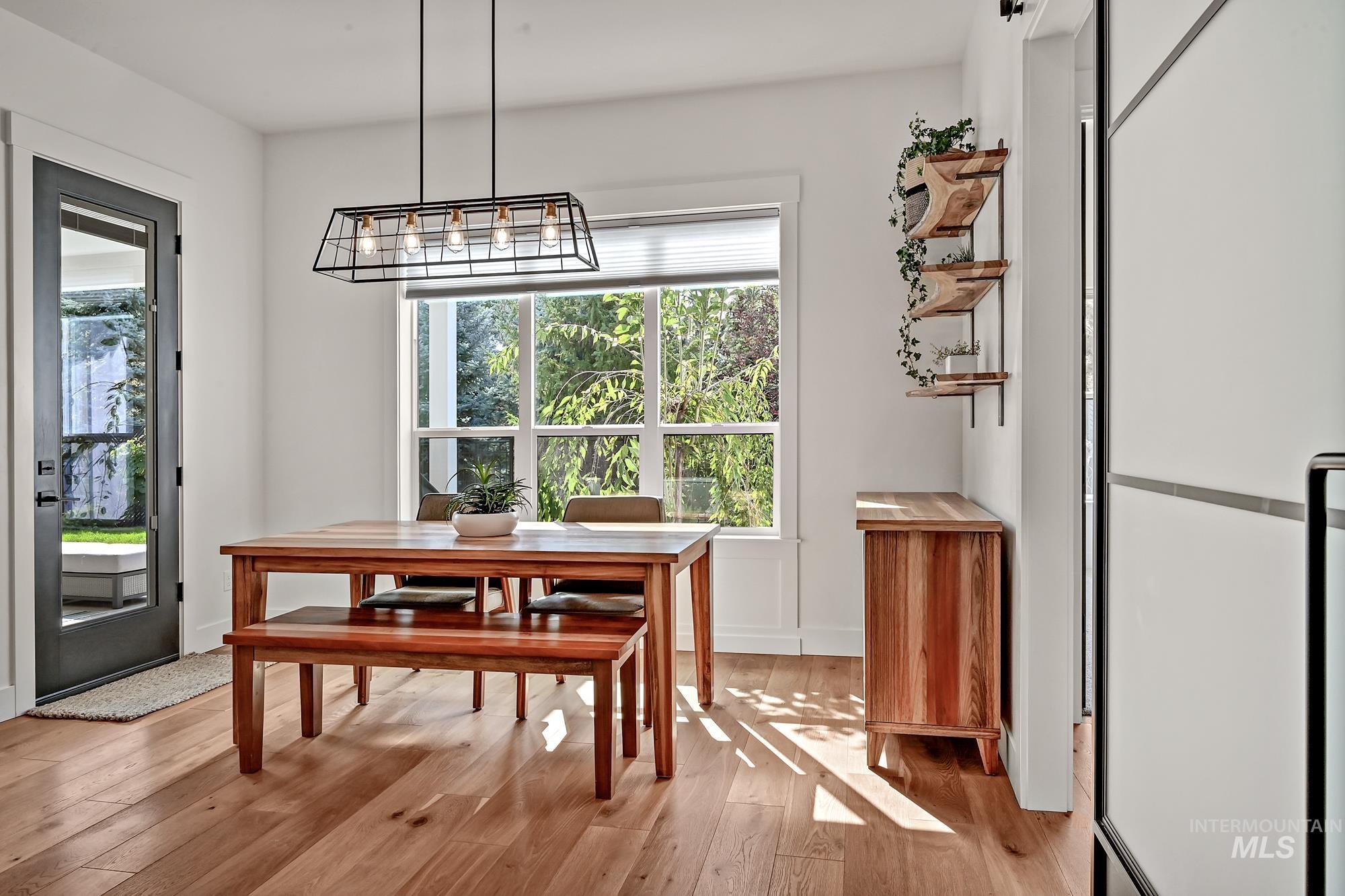 Dining area featuring hardwood / wood-style floors
