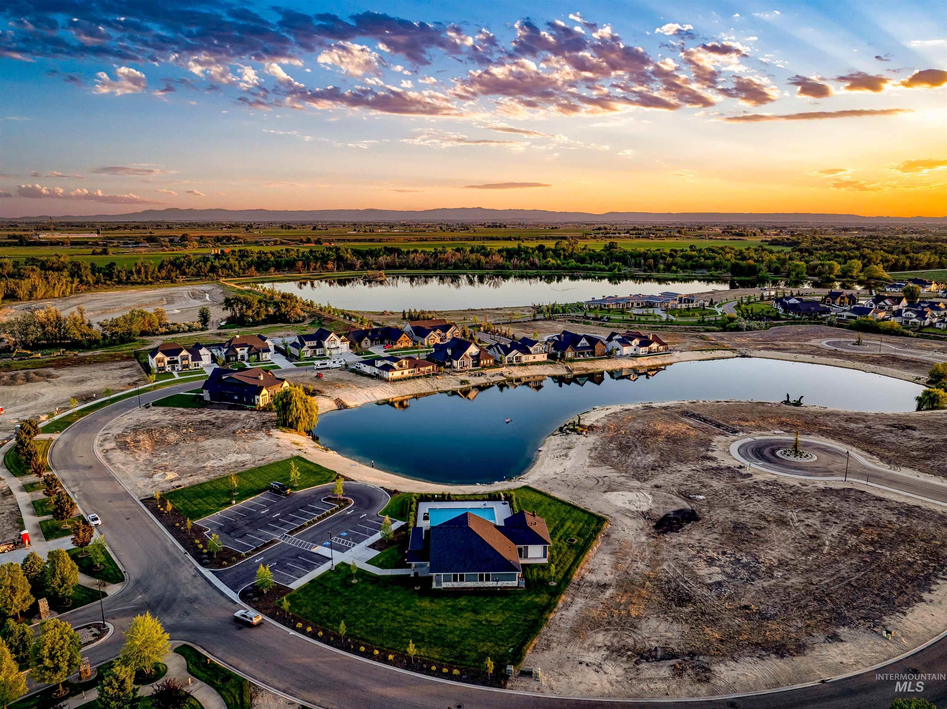 Aerial view at dusk of a water and mountain view