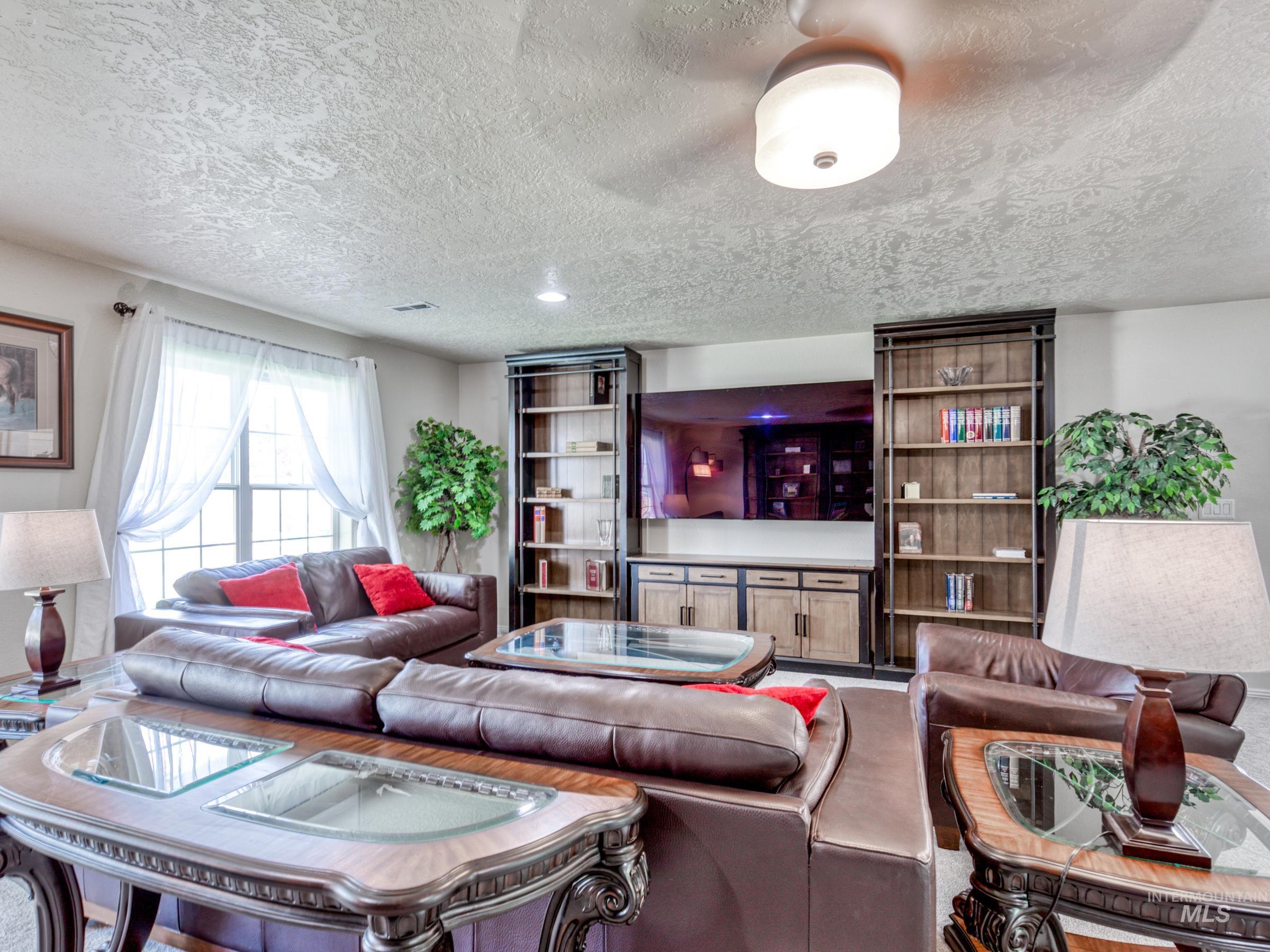 Living room with a textured ceiling