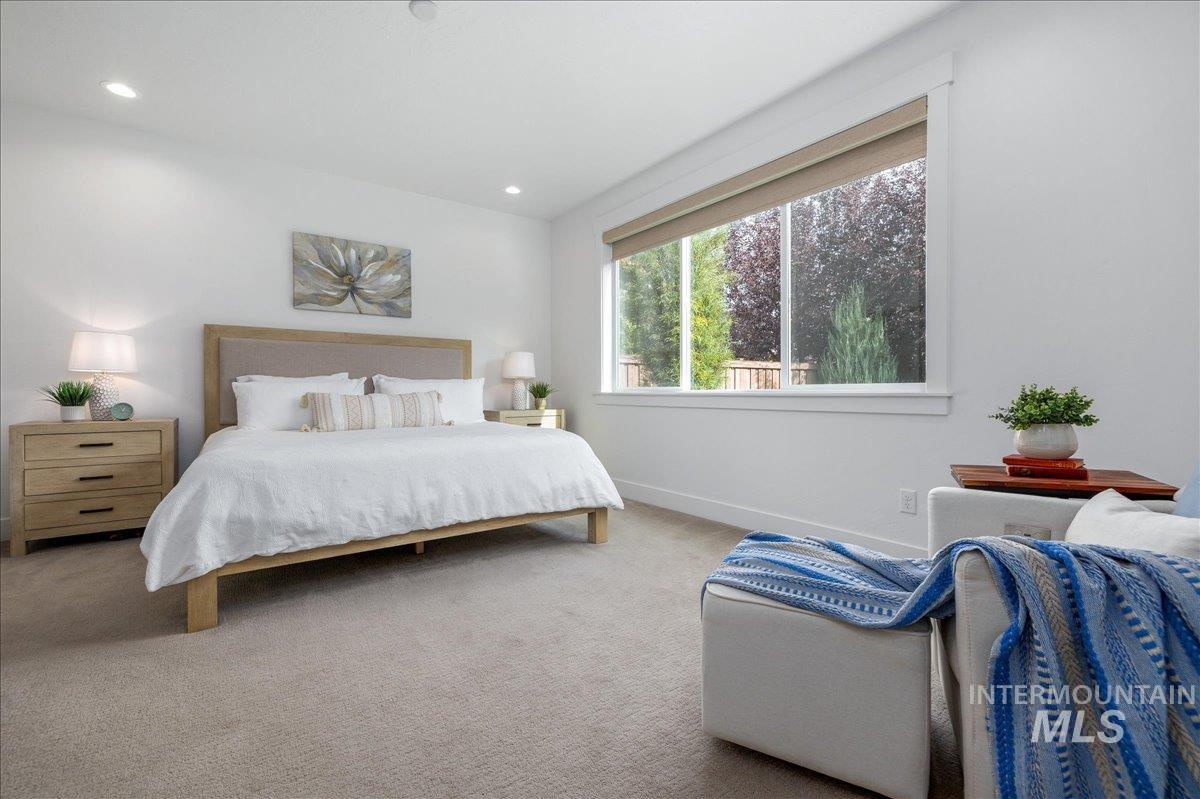 Bedroom featuring carpet and recessed lighting