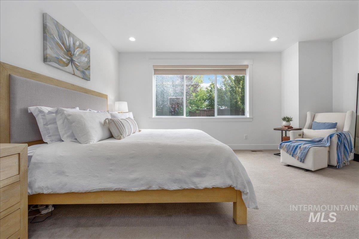 Bedroom featuring carpet and recessed lighting