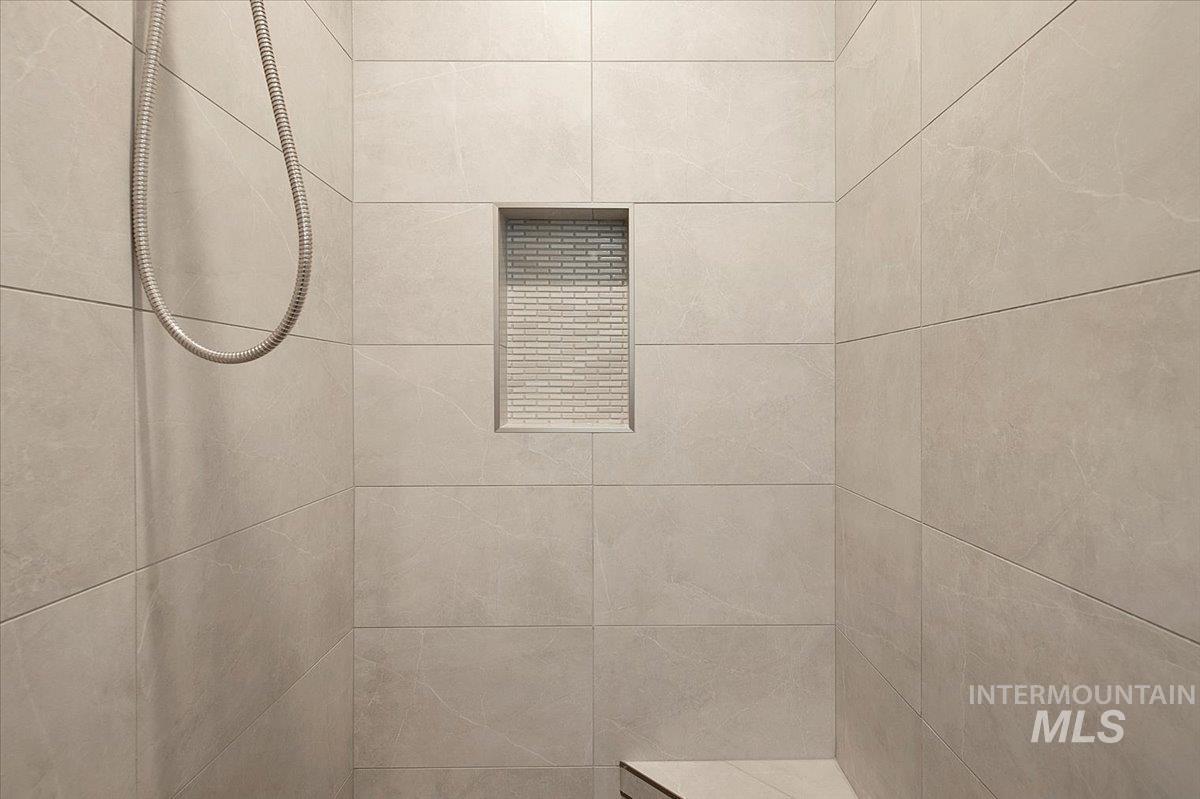 Bathroom view of tiled shower