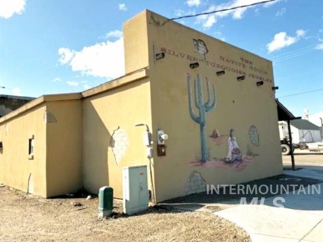 View of home's exterior featuring stucco siding