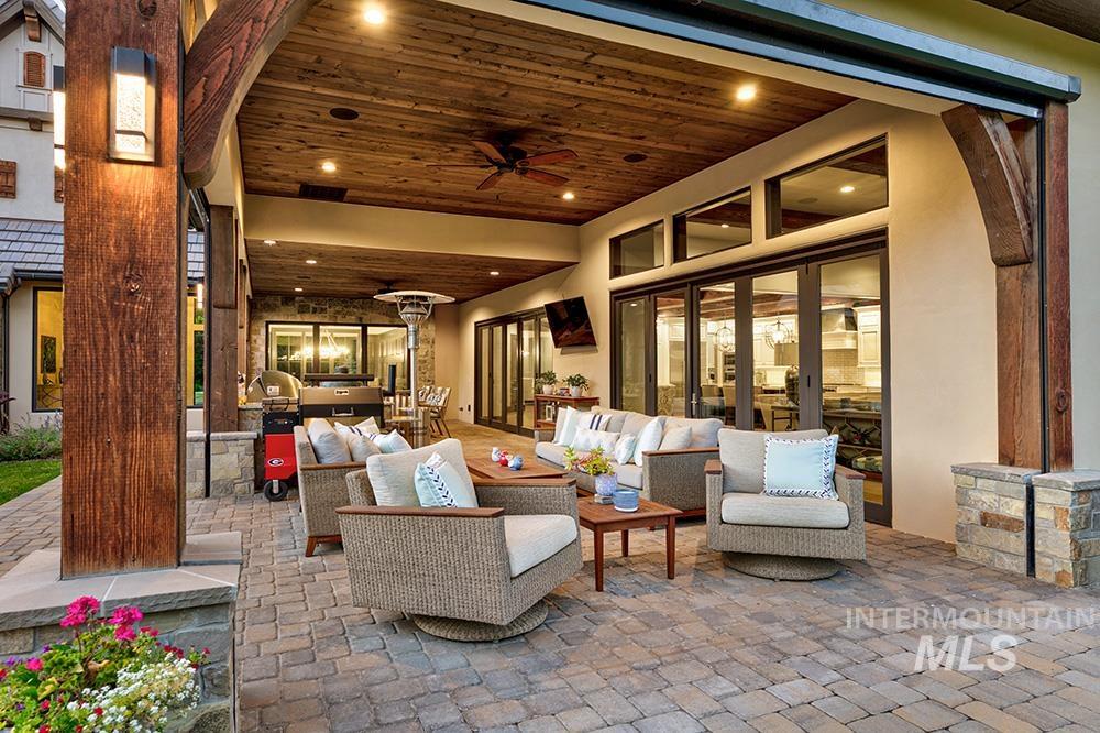View of patio / terrace with ceiling fan and outdoor lounge area