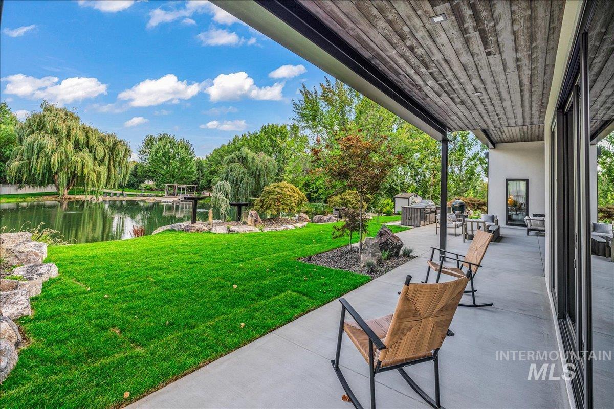 View of patio featuring a water view