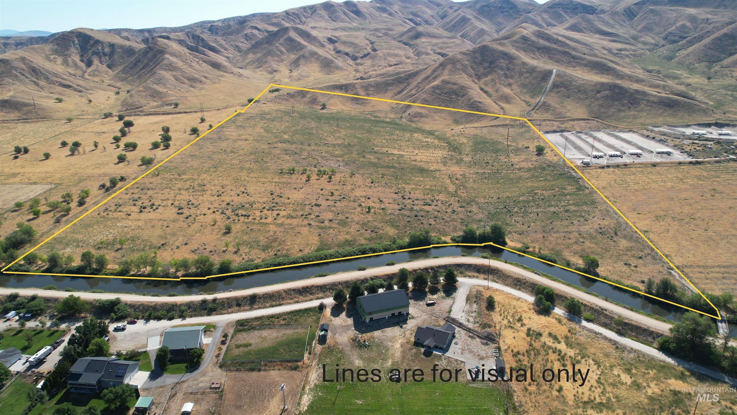 Overview of rural landscape featuring property parcel outlined
