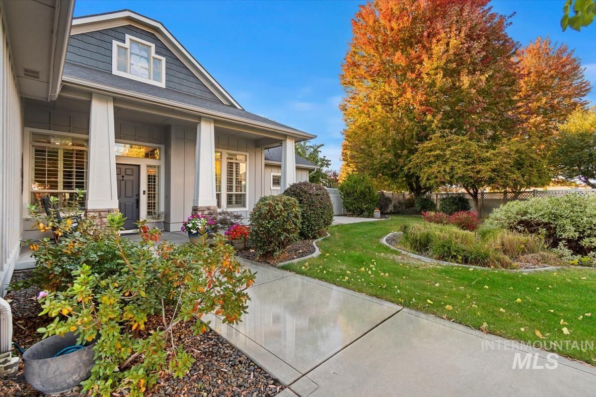 Property entrance with a porch and board and batten siding
