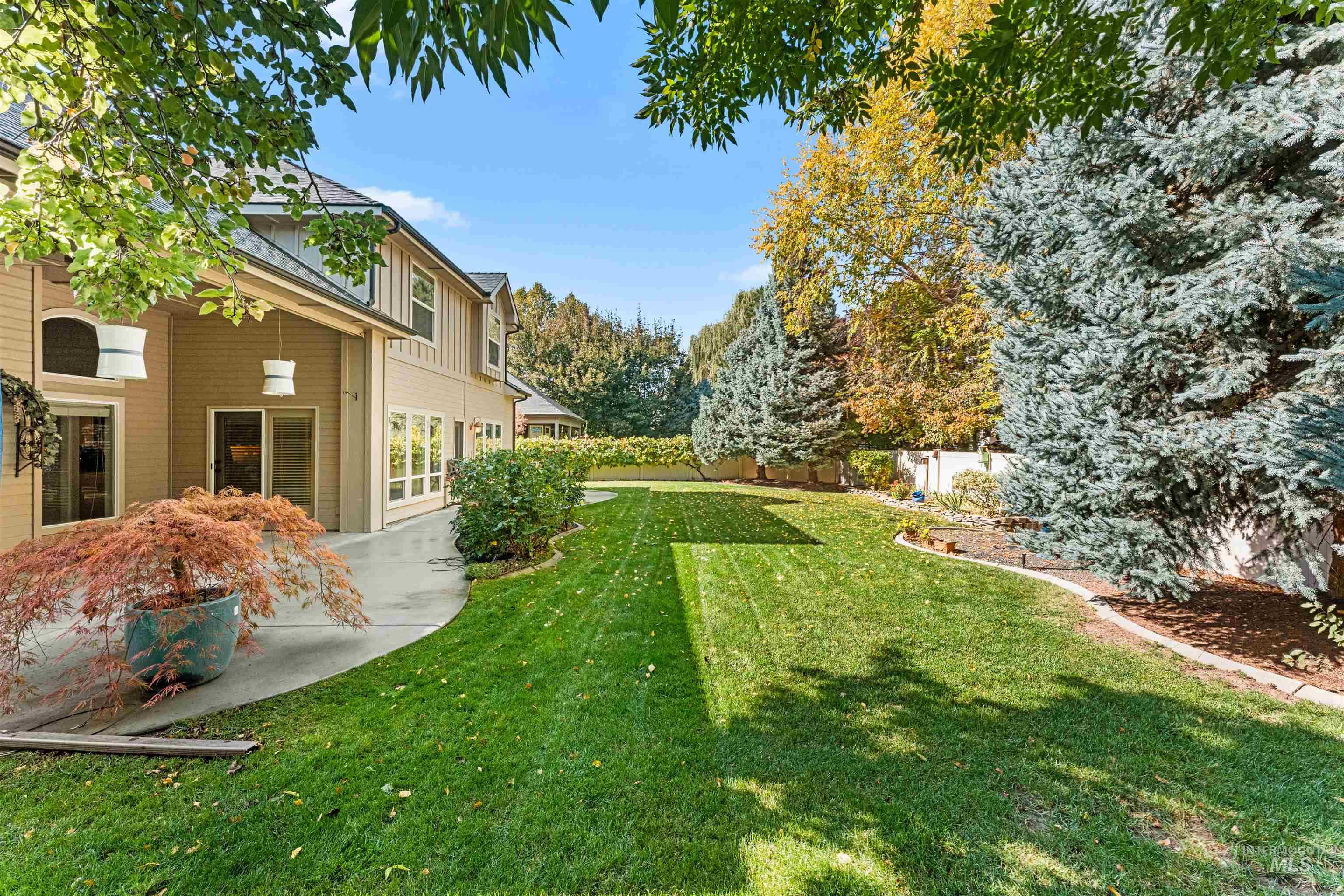 View of yard featuring view of wooded area