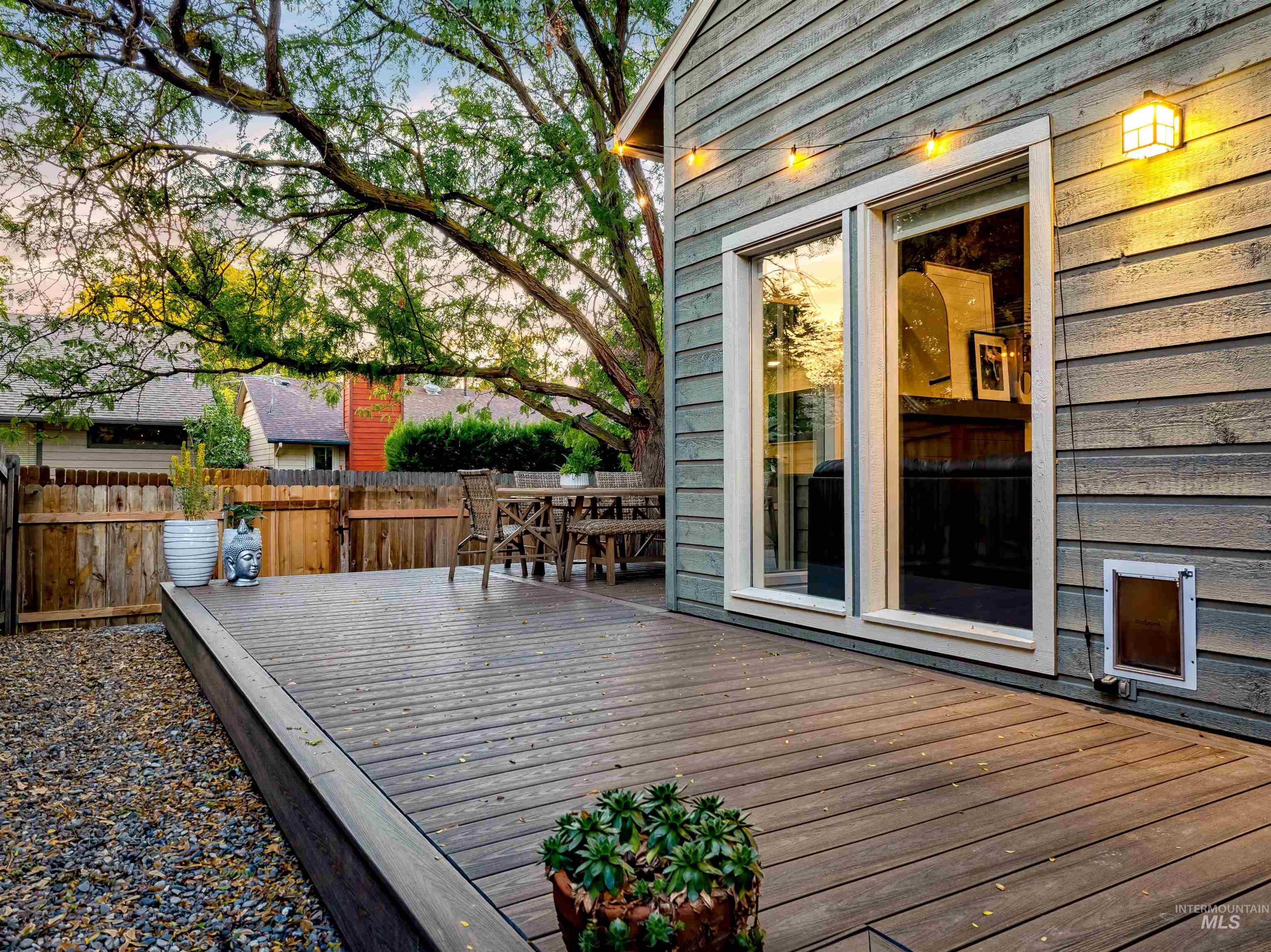 Wooden terrace featuring outdoor dining space