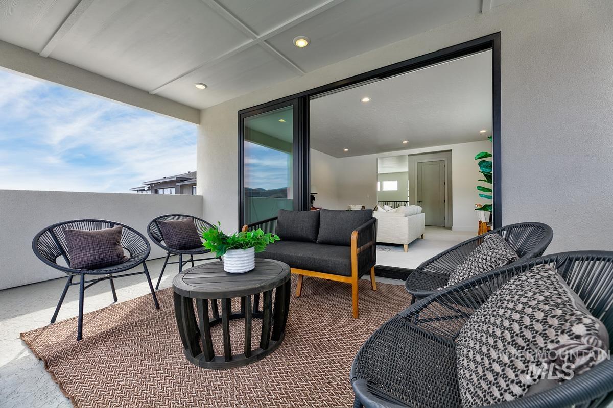 View of patio with an outdoor living space